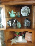 3 shelves of items in corner cabinet-includes decorative plates, teapot, platter, etc.