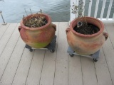 2 Terra Cotta Pots on rollers-very heavy!
