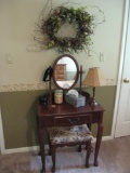 Table w/Mirror, Stool, Lamp, Wreath and other items on top.