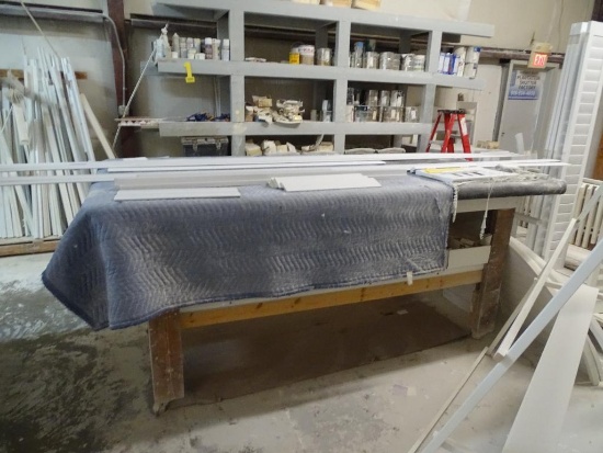 Table and items on table-99"L x 49" W x 45"H-on rollers-(includes hinges/panels)
