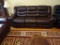 Leather like Sofa w/2 manual reclining seats.-Like New! 88