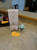 Silver hand towel holder and ceramic frog