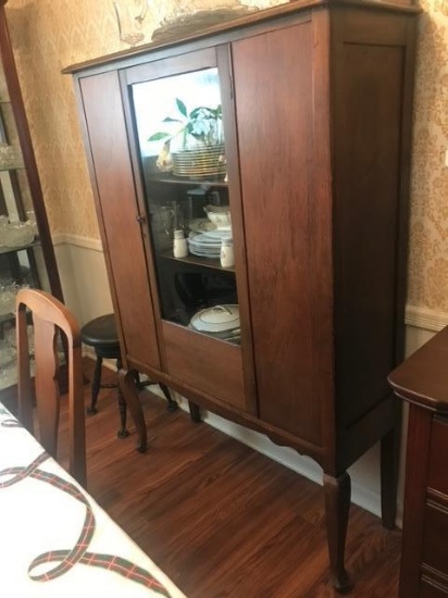 Vintage Fruitwood China cabinet w/walnut finish. 64"H x 42"W x 15"D. Does not include contents.