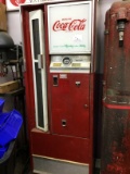 Coca cola up/right pop machine