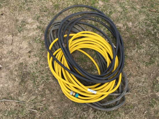 pile of garden hoses