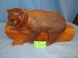 WOODEN CARVED  BEAR ON LOG  24 X 13
