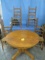 ROUND OAK TABLE W/ 4 LADDER BACK CHAIRS  28 X 35 X 42