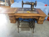 EUDORA SEWING MACHINE IN CABINET- NEEDS SOME REPAIR- SEE PHOTOS