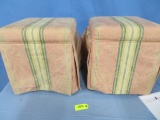 SET OF SKIRTED UPHOLSTERED OTTOMANS ON ROLLERS