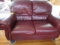 BURGUNDY LEATHER LOVESEAT