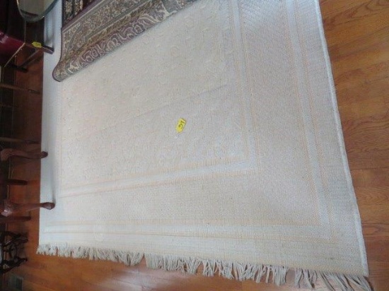 BEIGE AREA RUG  11 FT X 94" - HAS SMALL STAIN FROM SODA