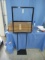 4- METAL SIGN STANDS- ONE IS ASSEMBLED, 3 NEW IN BOX
