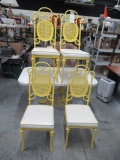 GLASS TOP YELLOW METAL PATIO TABLE W/ 4 CHAIRS - TABLE 50