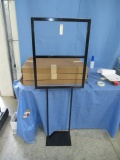 4- METAL SIGN STANDS- ONE IS ASSEMBLED, 3 NEW IN BOX