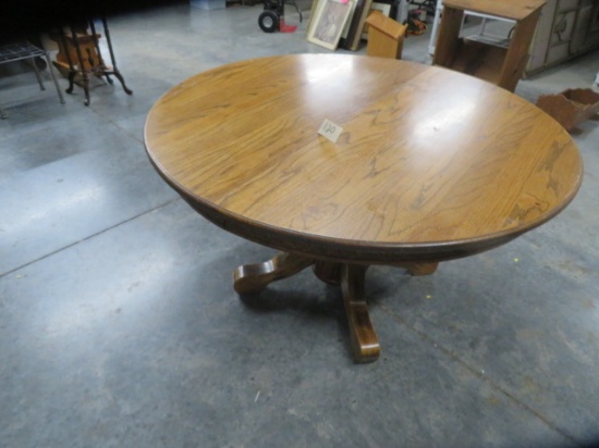 ROUND OAK DINING TABLE 54" D W/ ONE LEAF  @ 20"