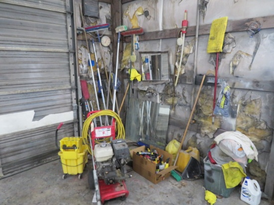 PRESSURE WASHER AND ITEMS IN CORNER