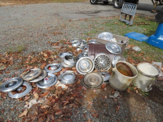 PILE OF HUBCAPS