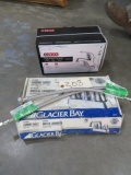 2 FAUCETS- DELTA  AND GLASIER BAY  WITH HOSES
