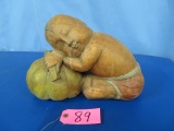 HAND CARVED FROM WOOD IN THAILAND  ASIAN CHILD ON MELON