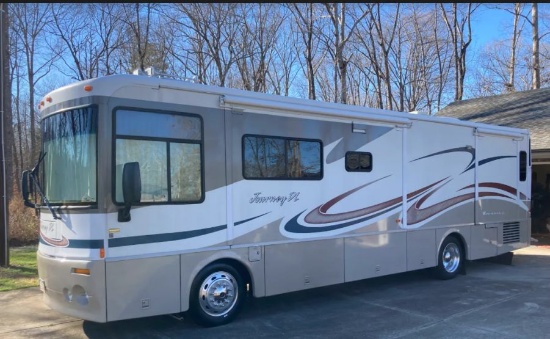 FORD TRACTOR AND 2003 WINNEBAGO AUCTION