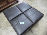 ROLLING LEATHER STORAGE OTTOMAN