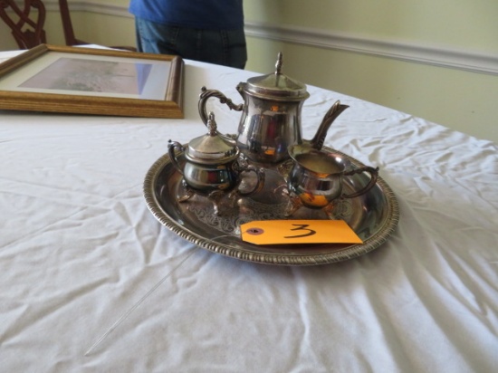silver plated tea set on tray