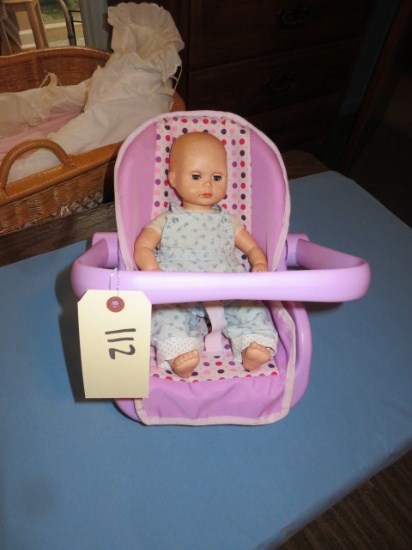 DOLL IN CARRIER
