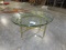 GLASS TOP BRASS COCKTAIL TABLE  34 X 16 X 25