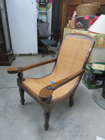 ANTIQUE PLANTATION ARM  CHAIR FROM INDONESIA  W/ WOVEN BACKING