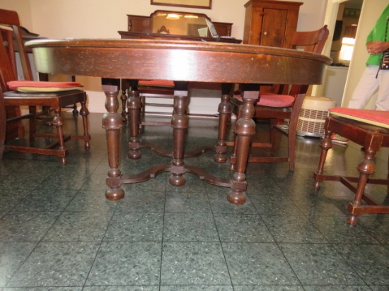 ROUND DINING TABLE BY HOWARD FURNITURE 1909