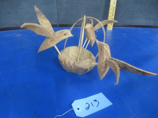 BIRDS IN NEST MADE FROM COCONUTS