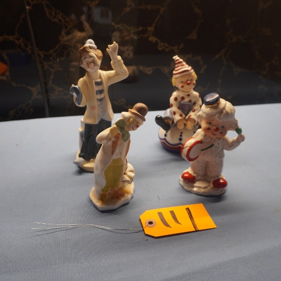 4 CLOWN FIGURINES