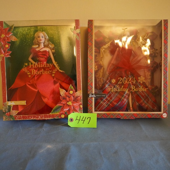 2 HOLIDAY BARBIES