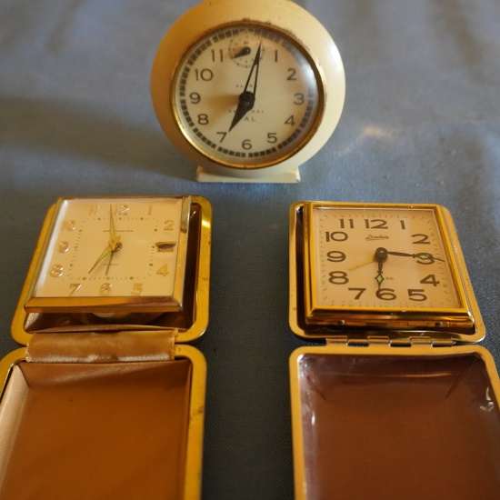 3 TRAVELING ALARM CLOCKS