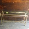 GLASS TOP BRASS TABLE  27 X 58 X 16