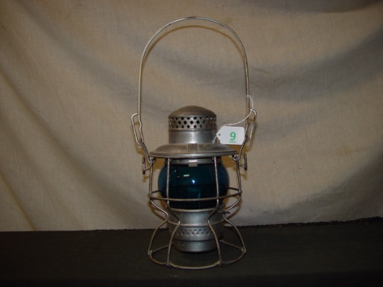 RR lantern marked PC (Penn Central).  Short blue globe