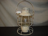 RR lantern marked C&NW. Tall clear globe embossed C&NWR