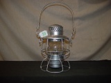 RR lantern marked GNRR. Short clear globe