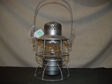 RR lantern. Short clear globe etched C & NW
