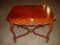 Ornate carved veneered mahogany table. Some veneer issues. Local pickup only