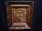 Framed copper tooling “Mask” by local artist Linda Auman 18x16