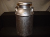 Milk can painted silver. Local pickup only
