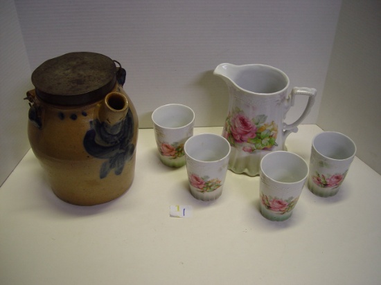 Pottery pitcher with cover and decorated pitcher with 4 cups