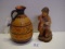 Hand carved wooden boy with dog and reproduction (tagged) wine jug