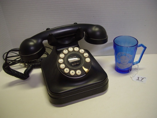 Retro style desk phone and Shirley Temple blue glass has crack