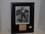Framed print with Cornel Wilde autograph