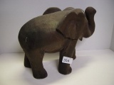 Wood carved elephant missing tusks 10” tall 12” long 2 pics