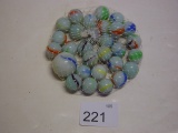 Swirl marbles with shooter in unopened bag