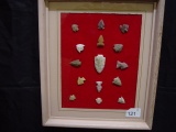 Framed collection of Native American arrow heads