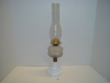 Early fluid lamp with milk glass base 19 ½” tall